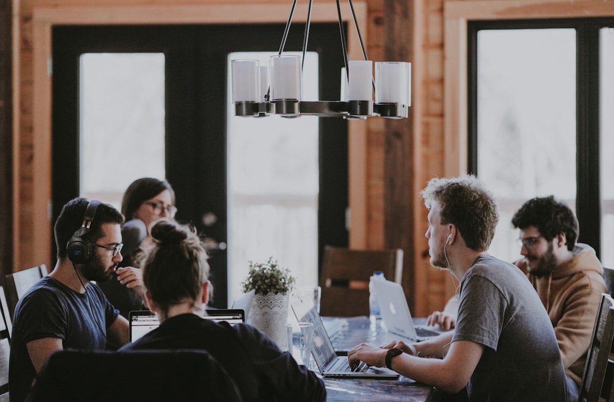 Team of professionals collaborating, representing OnPay's payroll and HR platform